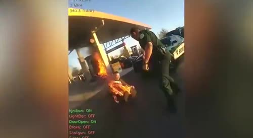 Cop and taser at the gas pump(repost)
