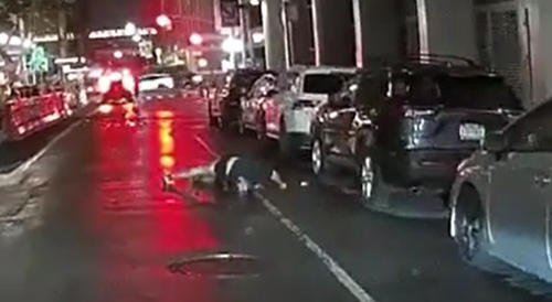 Man finds creative way to hail a taxi.