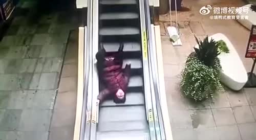 Friday Classic: Old Chinese woman on an escalator!
