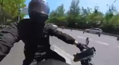 Taiwanese Biker Knocked Out In Freaky Accident