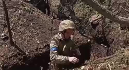 Dead invader in trench taken by Ukrainian troops