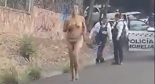 Naked Woman Attempts to Steal Police Car