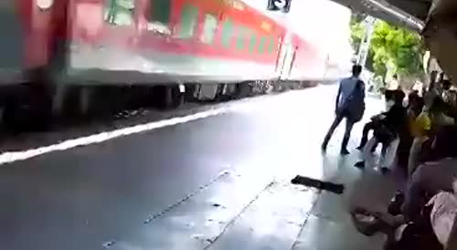 Dude Falls From Moving Train In India