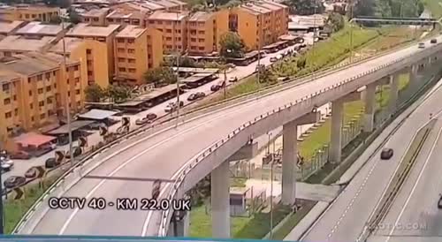 Crash Sends Ducati Rider Over a Bridge