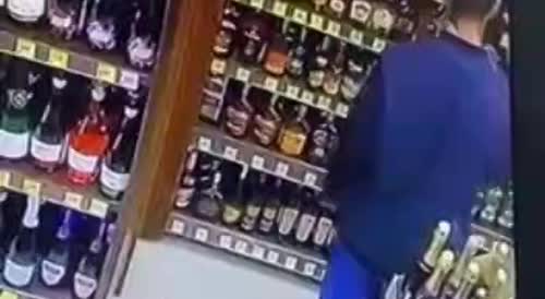 a migrant from Asia drank alcohol for free from the counter