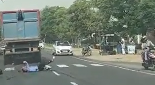 Biker Ran Over By Truck In India