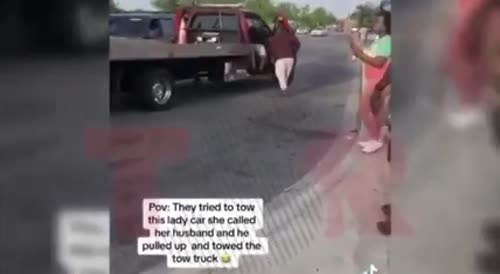 Husband prevents wife’s vehicle from being towed by towing the tow truck