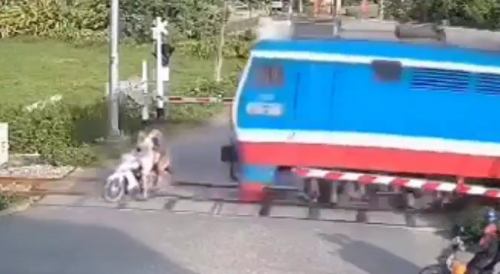Vietnam Riders Can't Beat Train