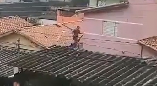 Thief Falls Thru The Roof During Police Chase In Brazil