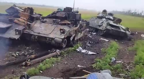 Humiliation of NATO. Russian tank against the background of folded American equipment