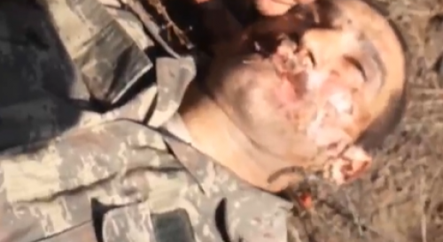 Armenian soldier cuts the ears of azeri(repost)