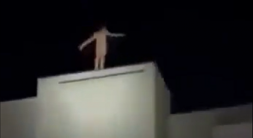 Naked Man Climbs Building For His Final Jump