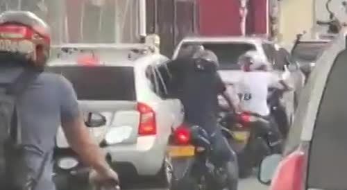 Driver Shoots Traffic Stop Robbers In Venezuela