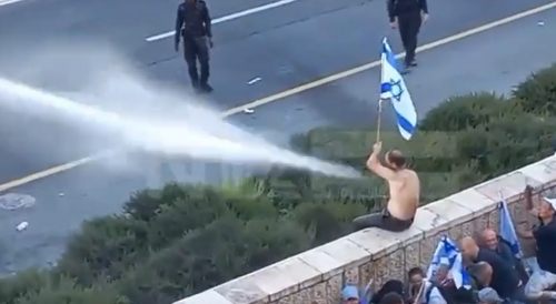Protester Takes A Shower Away