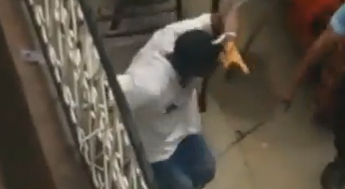 Nigerian Market Thief Tied And Beaten With Sticks