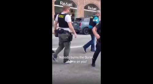 Danish Woman Is Tackled By Police For Trying To Stop The Burning Of A Koran