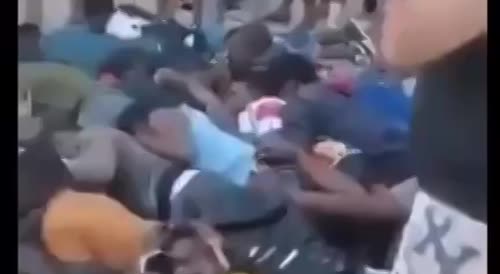 Migrants gathered after murdering local