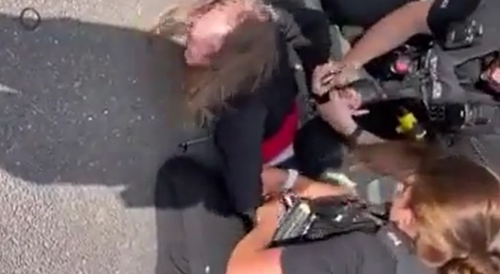 UK police pepper spray and arrest a teen girl in front of her mother