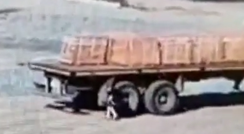 Worker Tries to Stop Truck. Fails Miserably