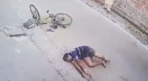 Cyclist Knocked Out By Running Bull In India