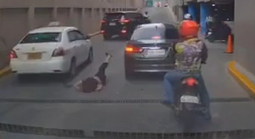 Woman ends her life in the middle of a busy street.