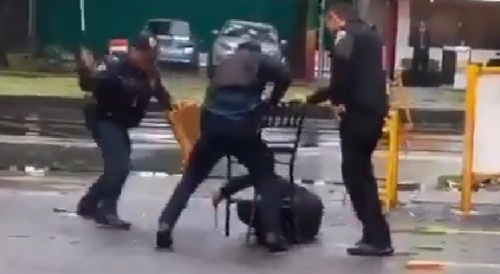 Police use chairs to subdue a subject armed with two knives in Mexico