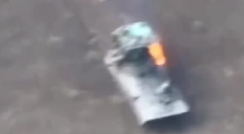 Invaders jumping of burning personnel carrier after it gets hit by FPV drone