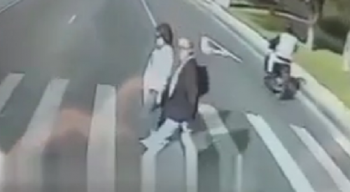 Couple Wrecked By Bus At Zebra Crossing