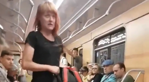 Trashy Bitch Assaults Random Guy On Moscow Subway Train