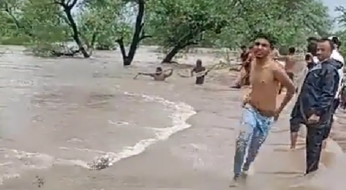 Man Drowns As Bystanders Watch During India Flood