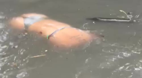 Female Body Floating In Mesquita River, Rio de Janeiro
