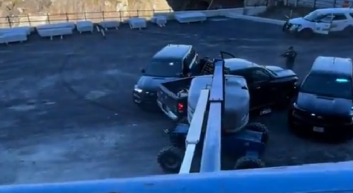 Police chase ends with man in boom lift being shaken