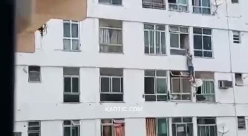 Man falls from a building window caught with a married woman.