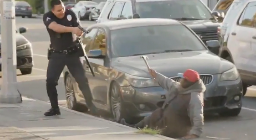RAW: Homeless OG Armed With A Hatchet Shot By LAPD