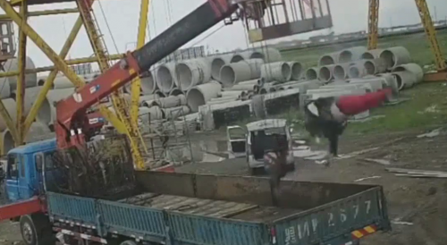 Crane Operator Hits Live Wire, Then The Ground