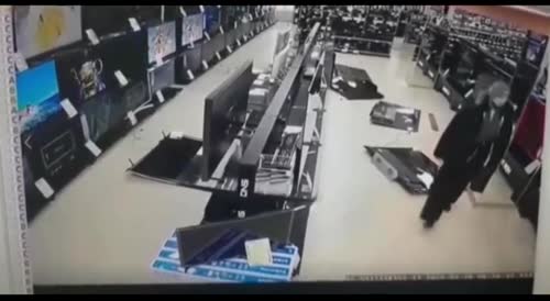 Russian Man Goes on Calm Rampage Smashing TVs