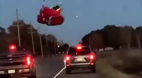 Louisiana Flying Grinch gets stuck on power lines