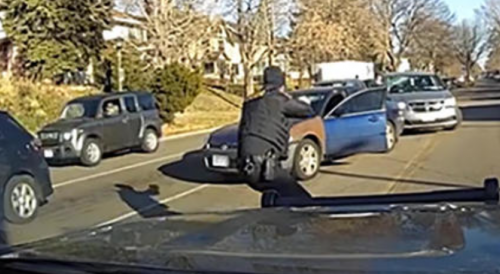 Minnesota police release footage of shootout that killed suspect, injured Officer