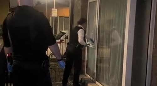 Guy Mocks Female Cop Struggling to Break into House