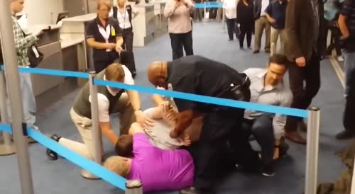 Airport Bully Gets Handled by Good Samaritans