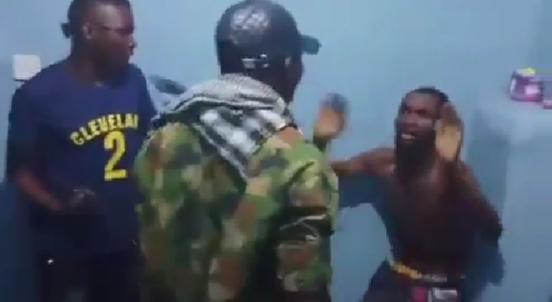 Nigerian Army Soldiers Flogging Civilian