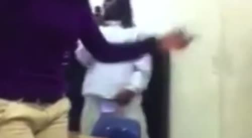 Two students fight and one gets wig pulled off