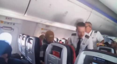Passengers pinning man down as flight to Chicago