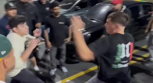 Hands Thrown At A Car Meet