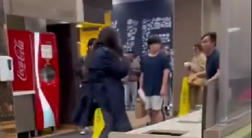 Long haired person gets into fight at a McDonalds in San Francisco
