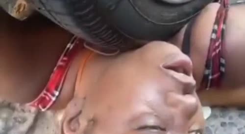 Woman Agonizing To Death While Trapped Under A Wheel