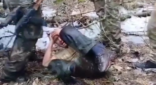 video of the capture of a terrorist in the forest. Screams like a bitch