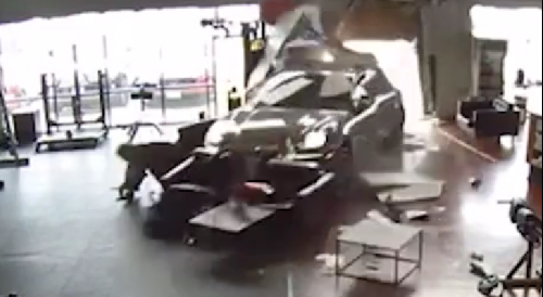 SUV crashing through Dallas gym's wall, striking two people