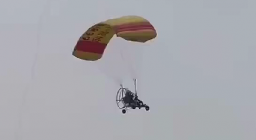 Paraglider Falls On The Road In China