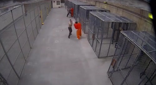Pretending To Be In Cuffs Inmate Fights Guard